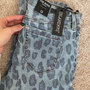 Brand new//never worn leopard denim jeans